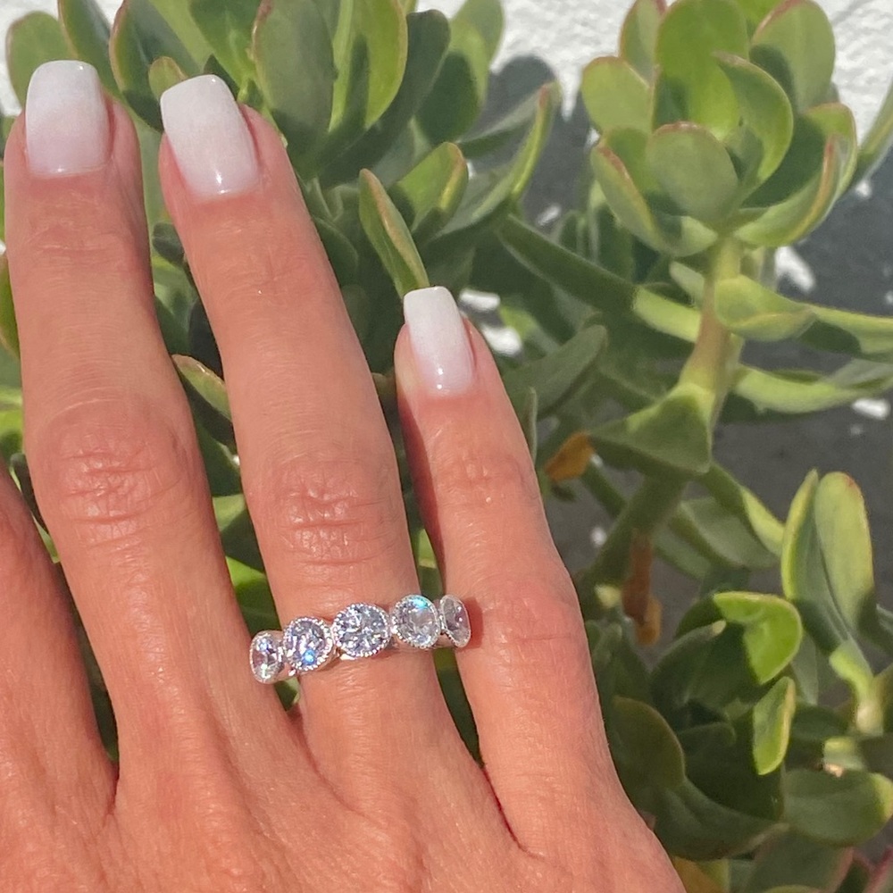 Moissanite 5 stone 1.5 ctw band 4.75
